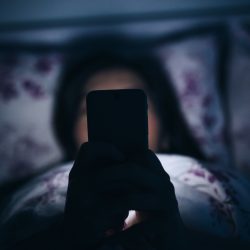 smartphone in bed