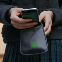 Phone being placed into phone pouch